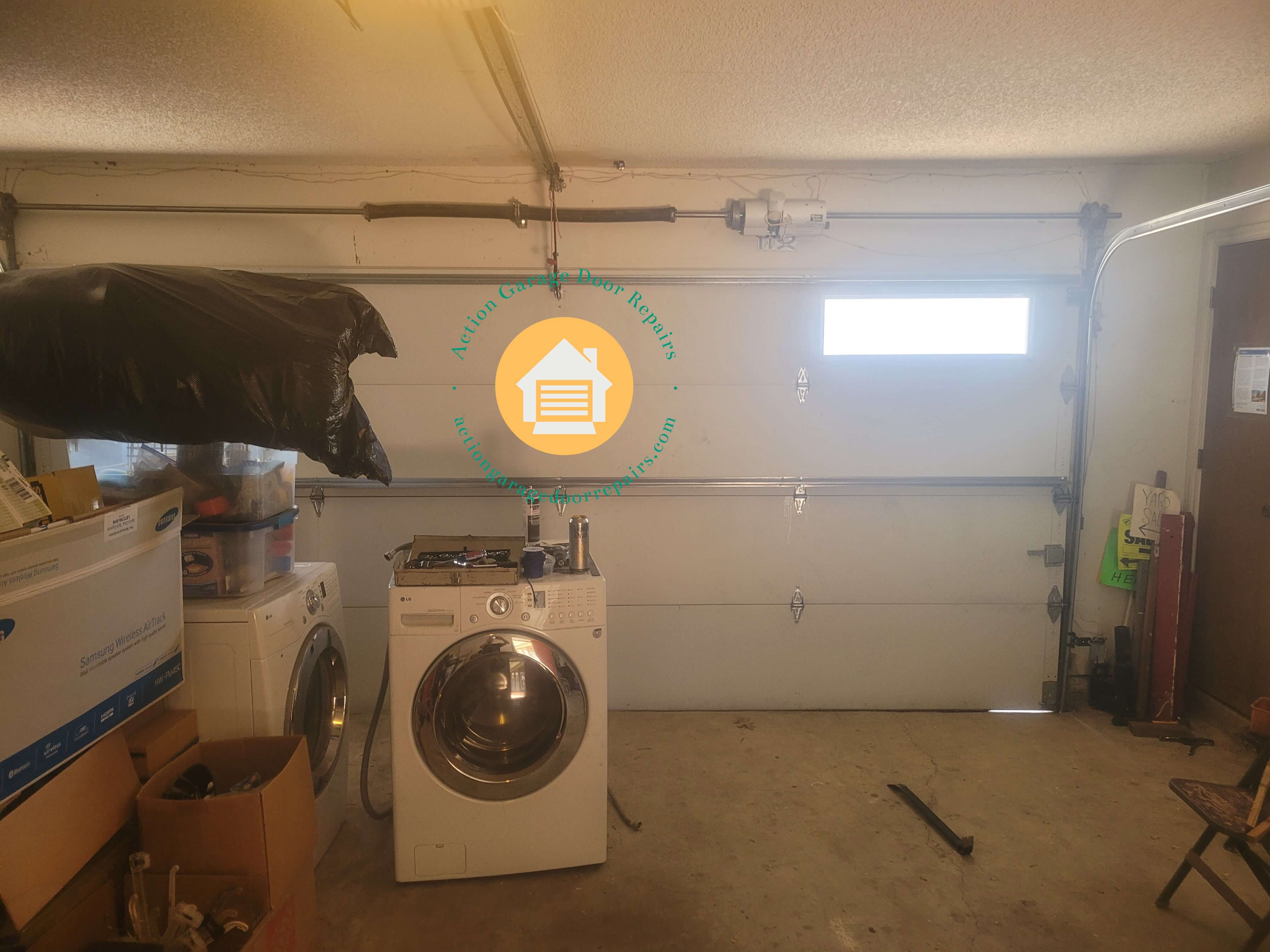 actiongaragedoorrepairs.com_garage_door_spring_replacement