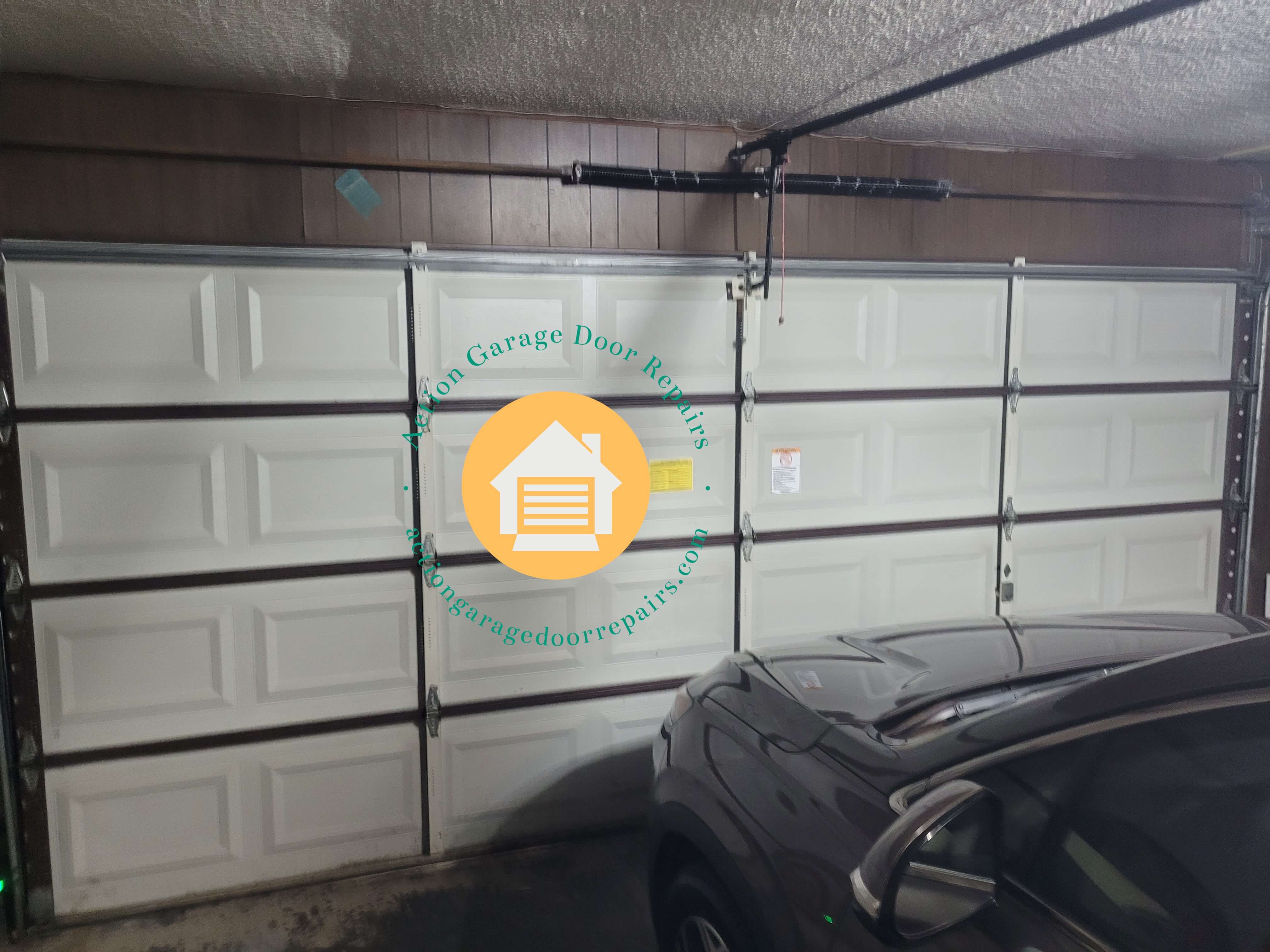 actiongaragedoorrepairs.com_garage_door_torsion_springs_replacement